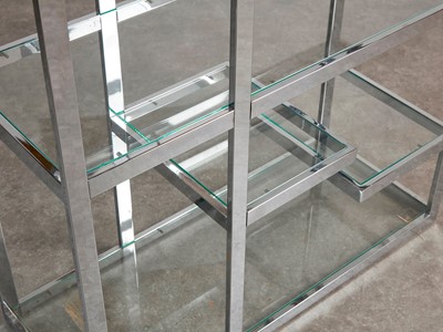 Lot 17 - A steel and glass étagère