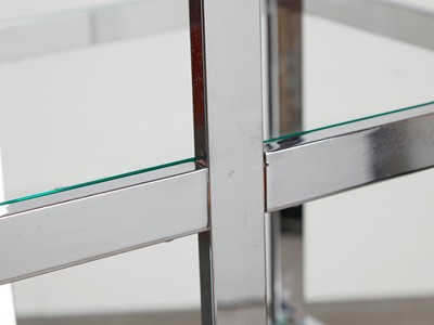 Lot 17 - A steel and glass étagère