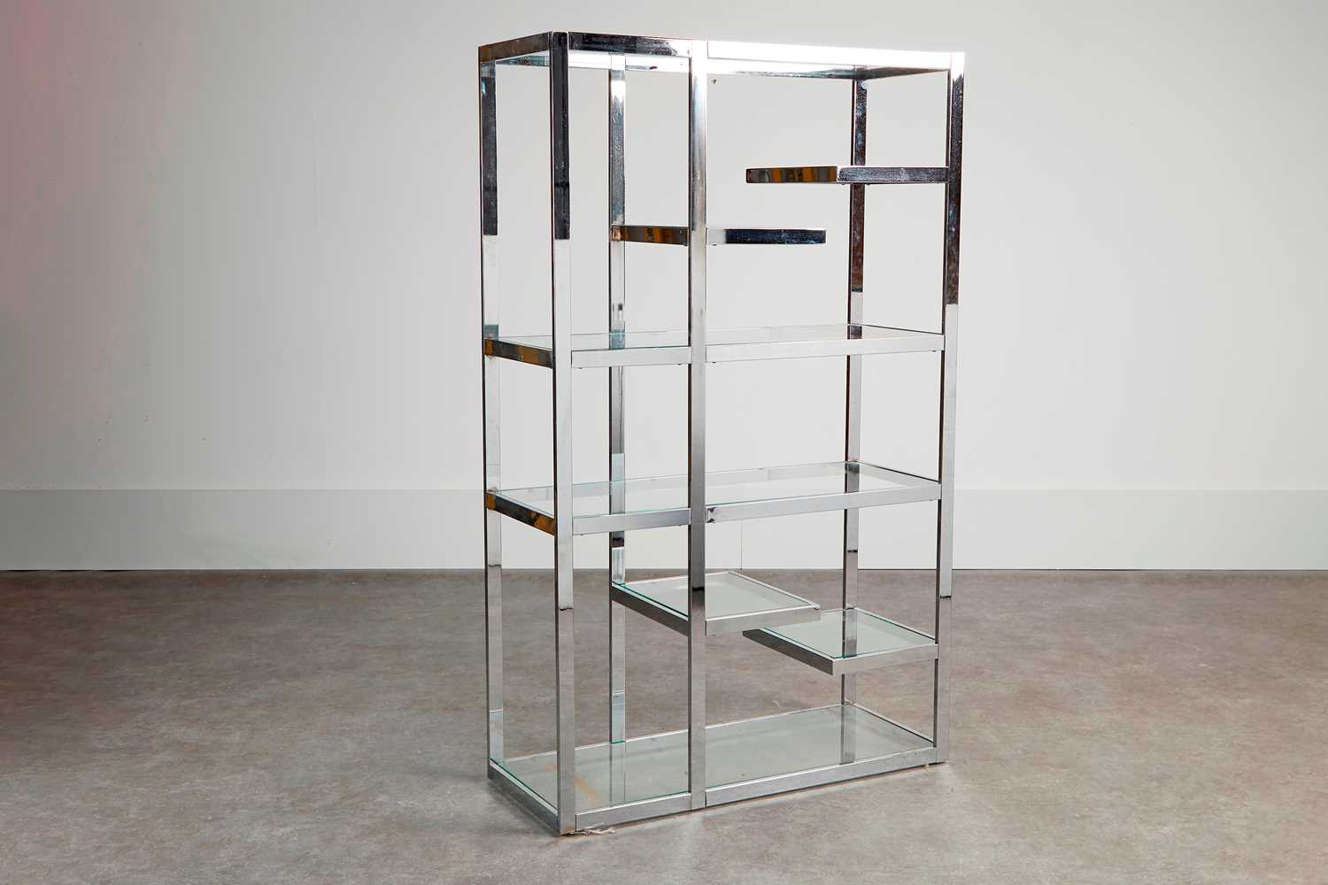 Lot 17 - A steel and glass étagère
