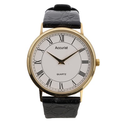 Lot 579 - A 9ct gold Accurist quartz strap watch