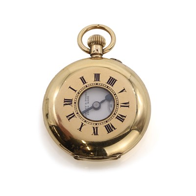 Lot 543 - A 14ct gold side wind half hunter fob watch