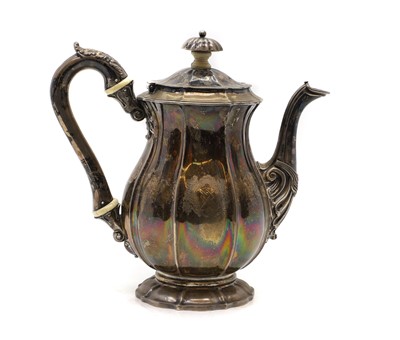 Lot 34 - A George IV silver coffee pot