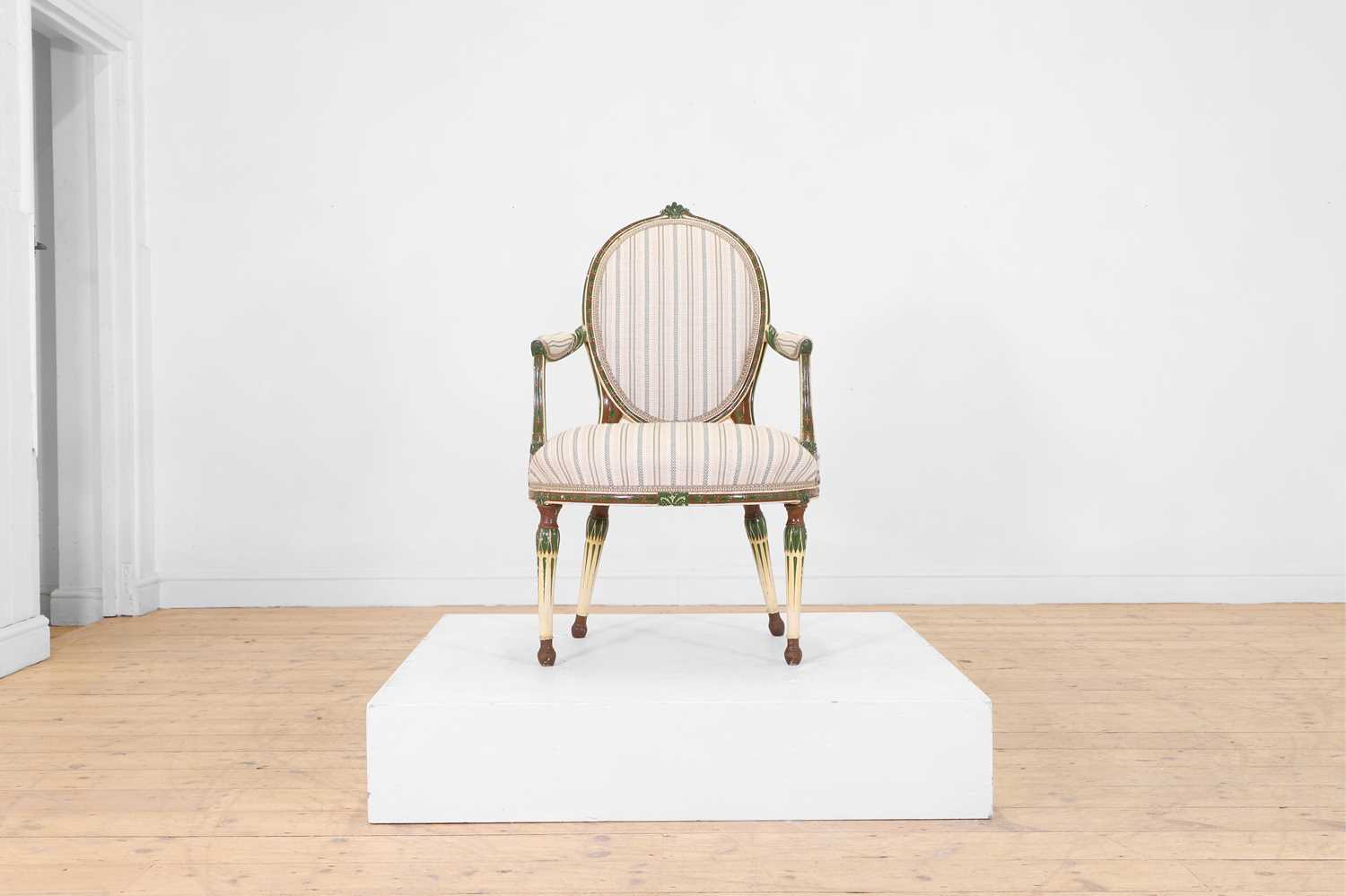 Lot 89 - A George III-style painted beech armchair