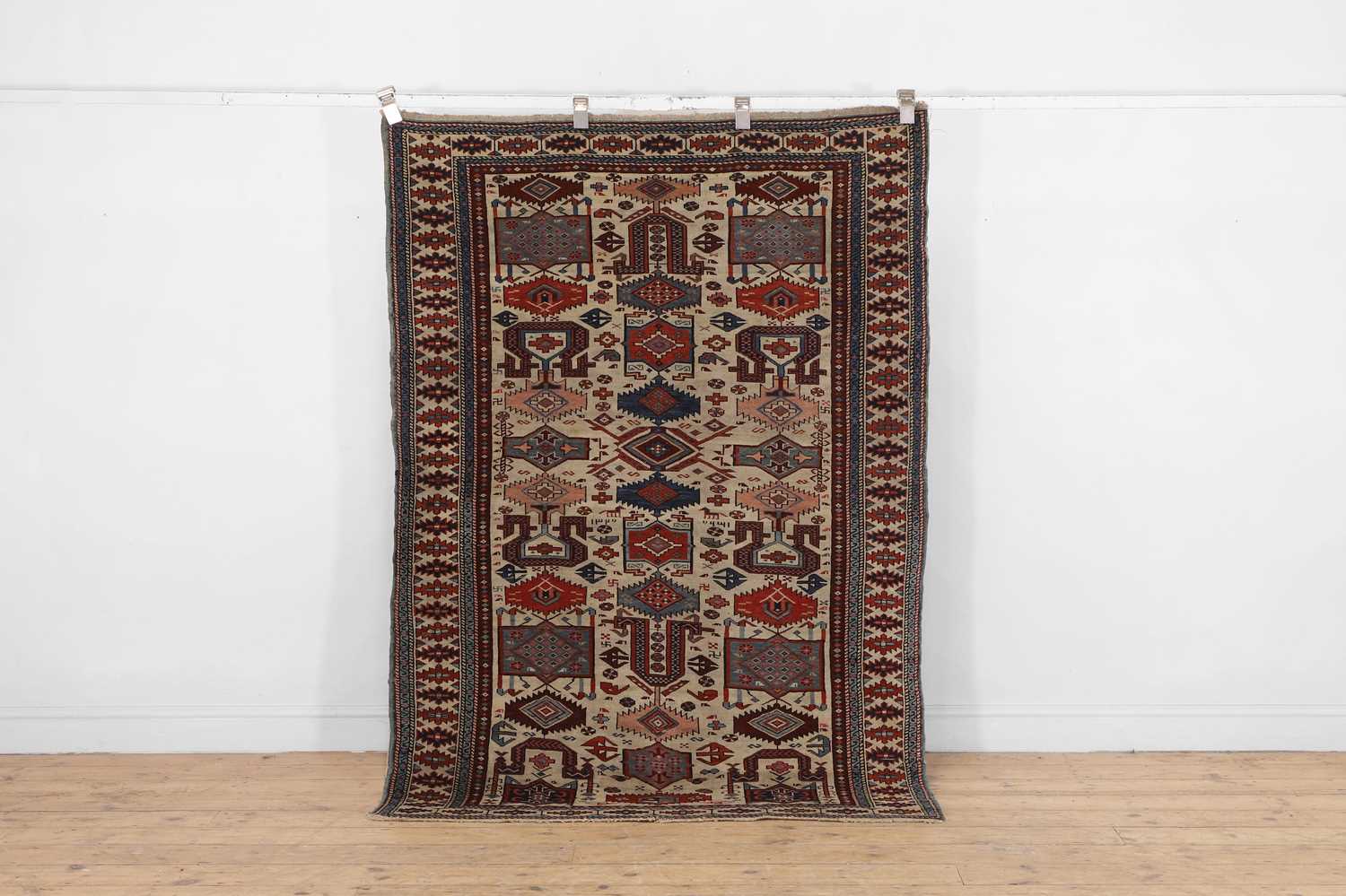 Lot 17 - A Kuba rug,