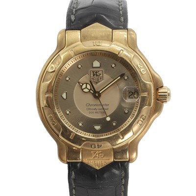 Lot 379 - An 18ct gold Tag Heuer 6000 automatic strap watch