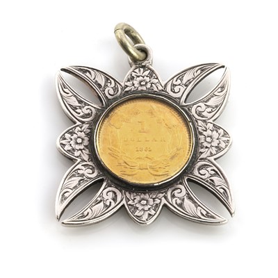 Lot 523 - A 1 dollar coin pendant