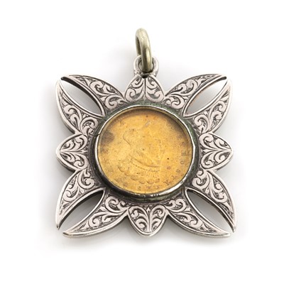 Lot 523 - A 1 dollar coin pendant