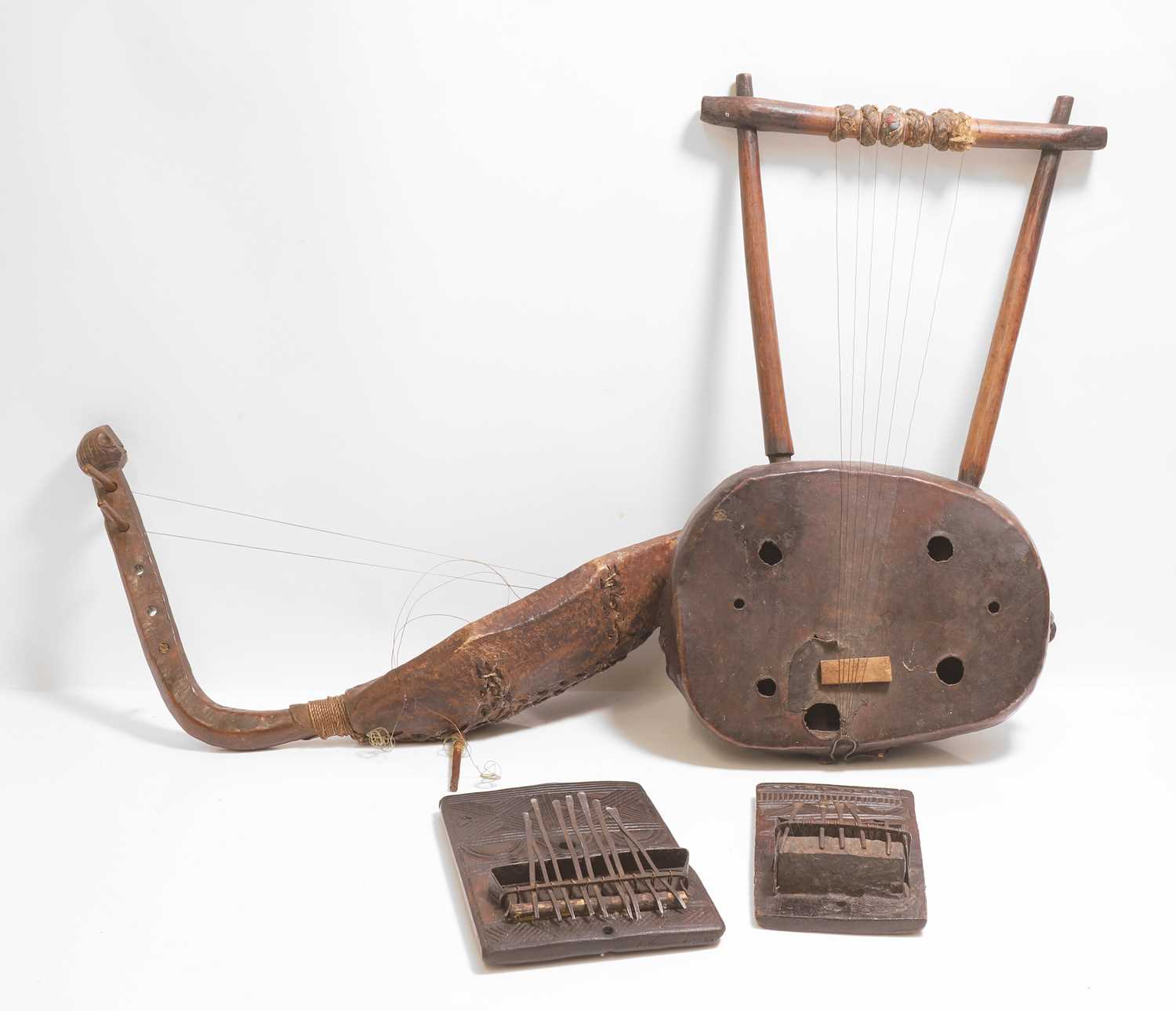 Tipanu Core Instrument Lot 269 - Four African folk instruments,