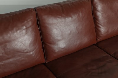 Lot 197 - A burgundy leather three-seater settee
