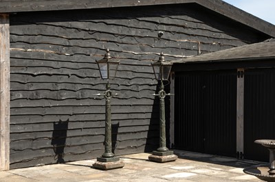 Lot 460 - A pair of Regency cast iron pier lights