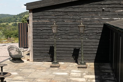 Lot 460 - A pair of Regency cast iron pier lights