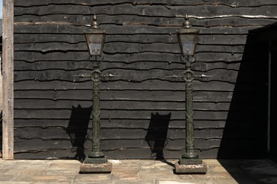 Lot 460 - A pair of Regency cast iron pier lights