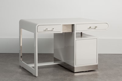 Lot 150 - A grey lacquered desk