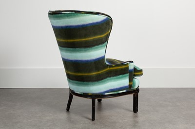 Lot 85 - A Regency-style wingback armchair