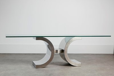 Lot 412 - A chrome and glass console table