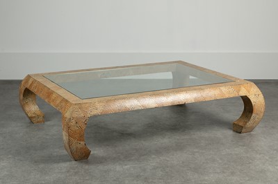 Lot 305 - A monumental coconut-shell-veneered coﬀee table