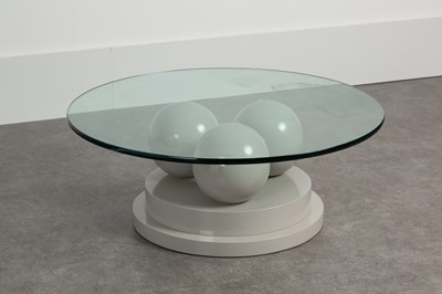 Lot 209 - A lacquered and glass coﬀee table