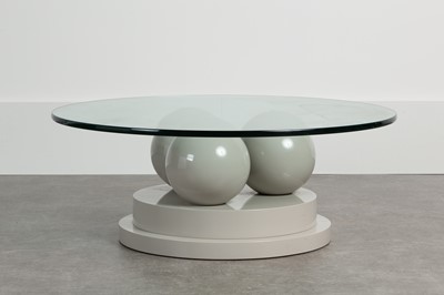 Lot 209 - A lacquered and glass coﬀee table