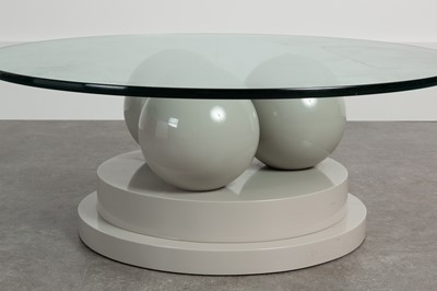 Lot 209 - A lacquered and glass coﬀee table