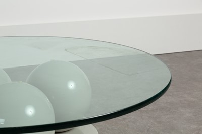 Lot 209 - A lacquered and glass coﬀee table