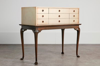 Lot 224 - A lacquer cabinet on an ebonised stand