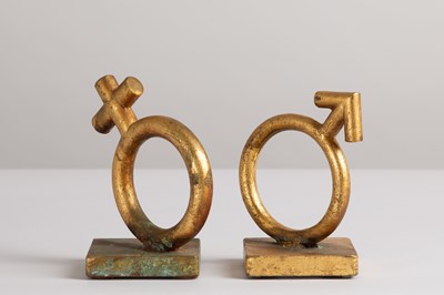 Lot 167 - A matched pair of gold-leafed cast-metal bookends