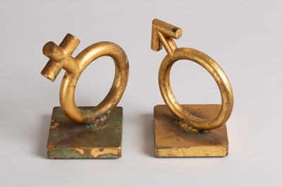 Lot 167 - A matched pair of gold-leafed cast-metal bookends