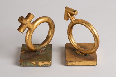 Lot 167 - A matched pair of gold-leafed cast-metal bookends