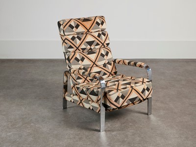Lot 54 - A chrome-framed reclining armchair