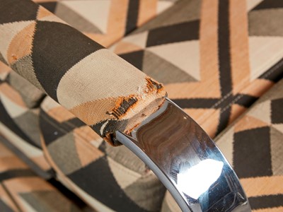 Lot 54 - A chrome-framed reclining armchair