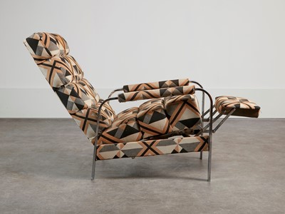 Lot 54 - A chrome-framed reclining armchair