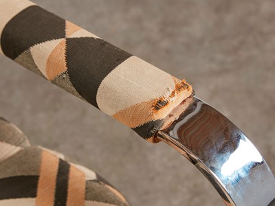 Lot 54 - A chrome-framed reclining armchair