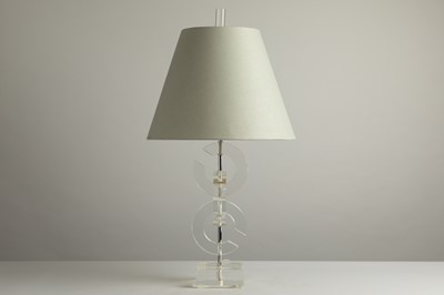 Lot 142 - A 'Chanel' Lucite table lamp