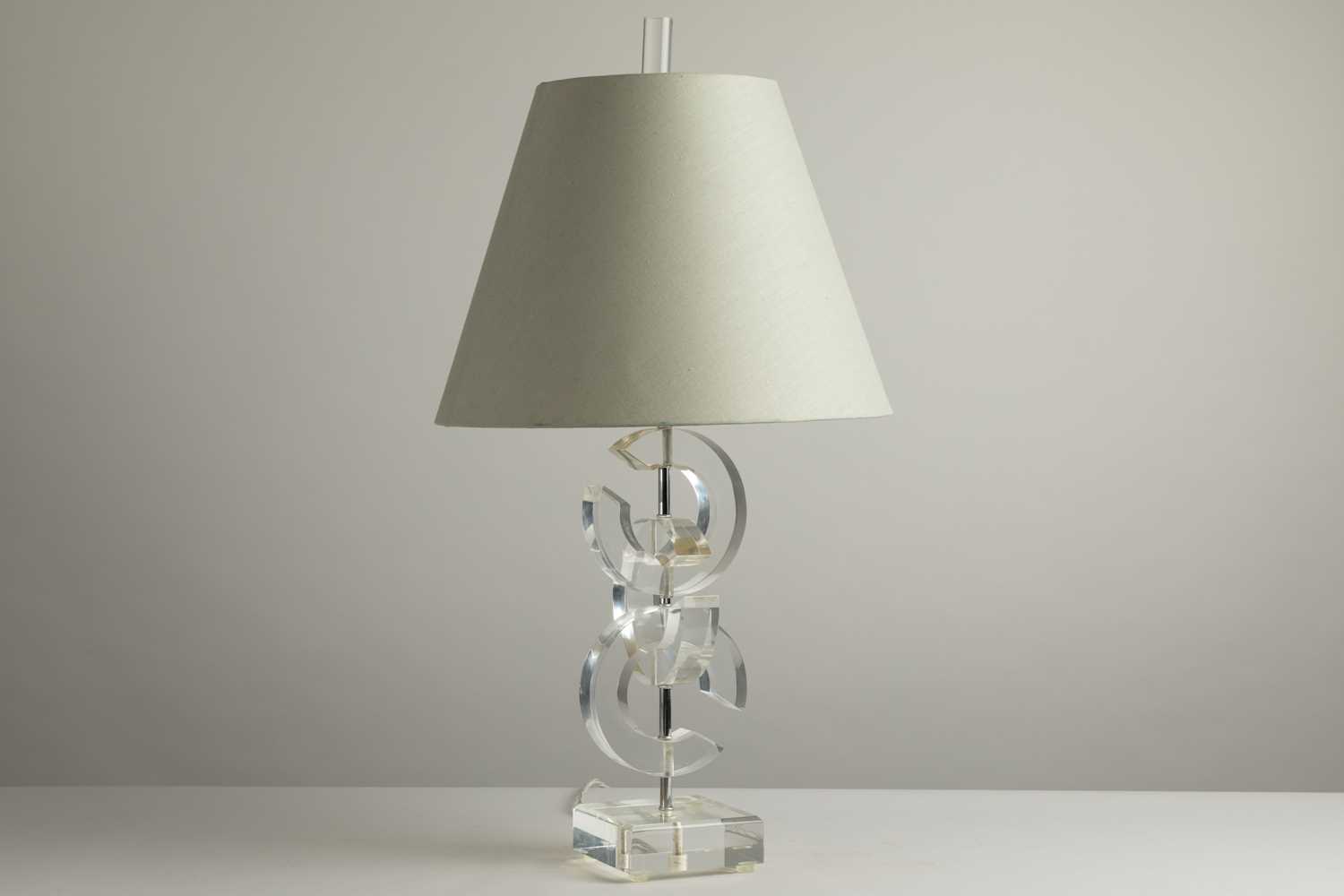Lot 142 - A 'Chanel' Lucite table lamp