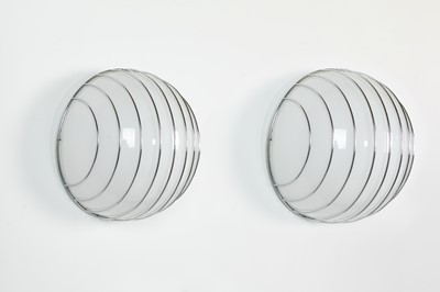 Lot 41 - A pair of acrylic and chrome wall lights