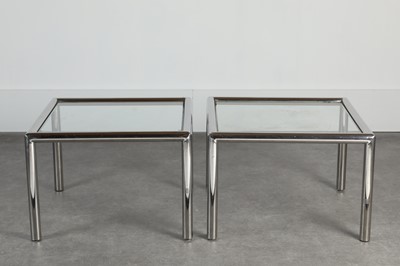 Lot 154 - A pair of chrome and glass side tables