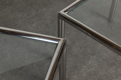 Lot 154 - A pair of chrome and glass side tables