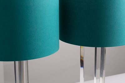 Lot 156 - A pair of Lucite table lamps