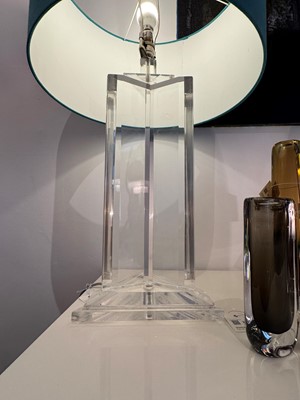 Lot 156 - A pair of Lucite table lamps