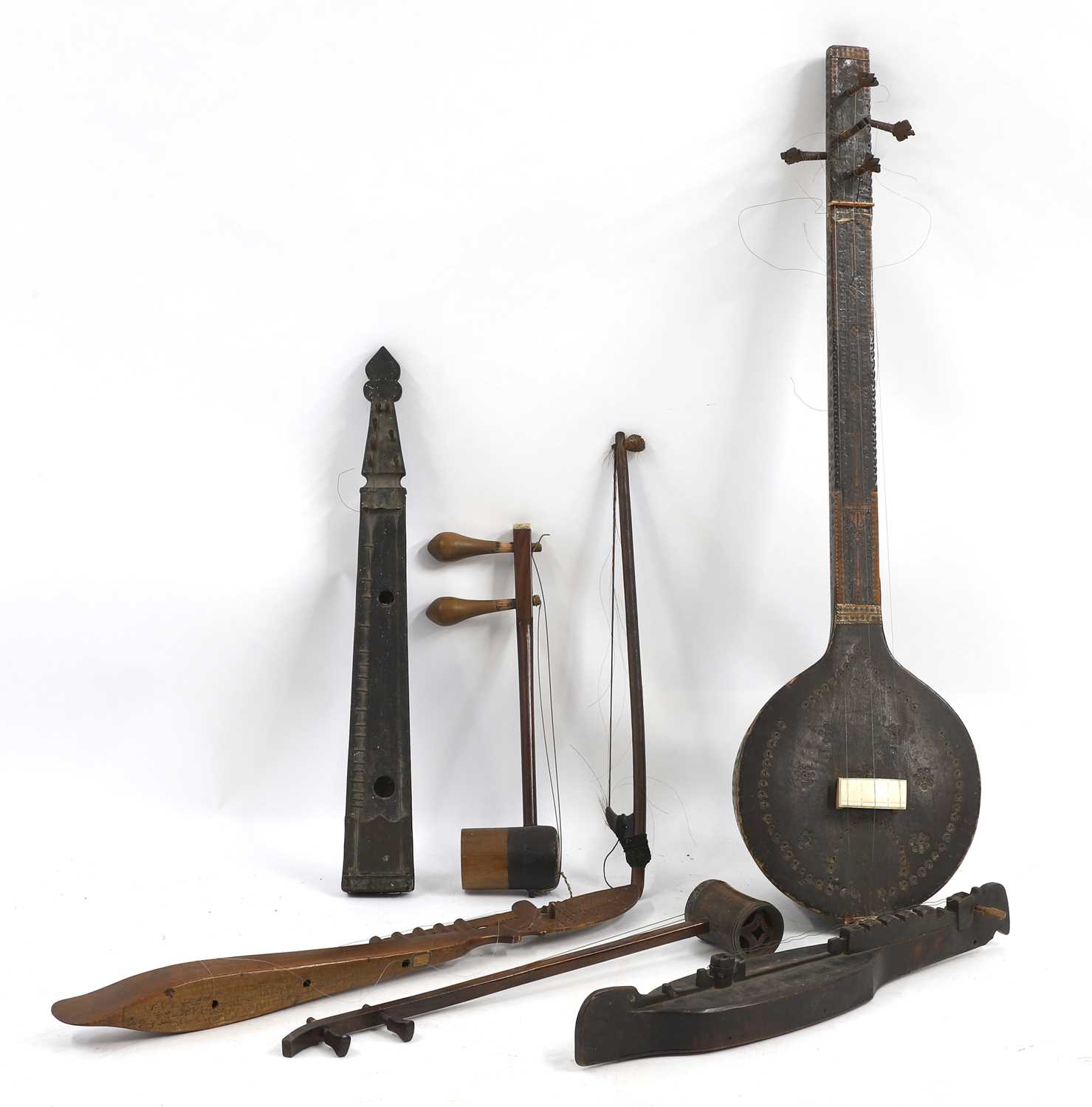 Lot 287 - A collection of Southeast Asian musical instruments