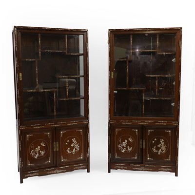 Lot 459 - A pair of Chinese inlaid rosewood and mother of pearl display cabinets