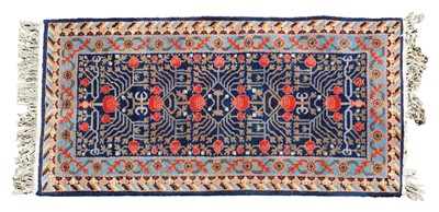 Lot 321 - A Persian rug, navy fields repeating motifs multi border