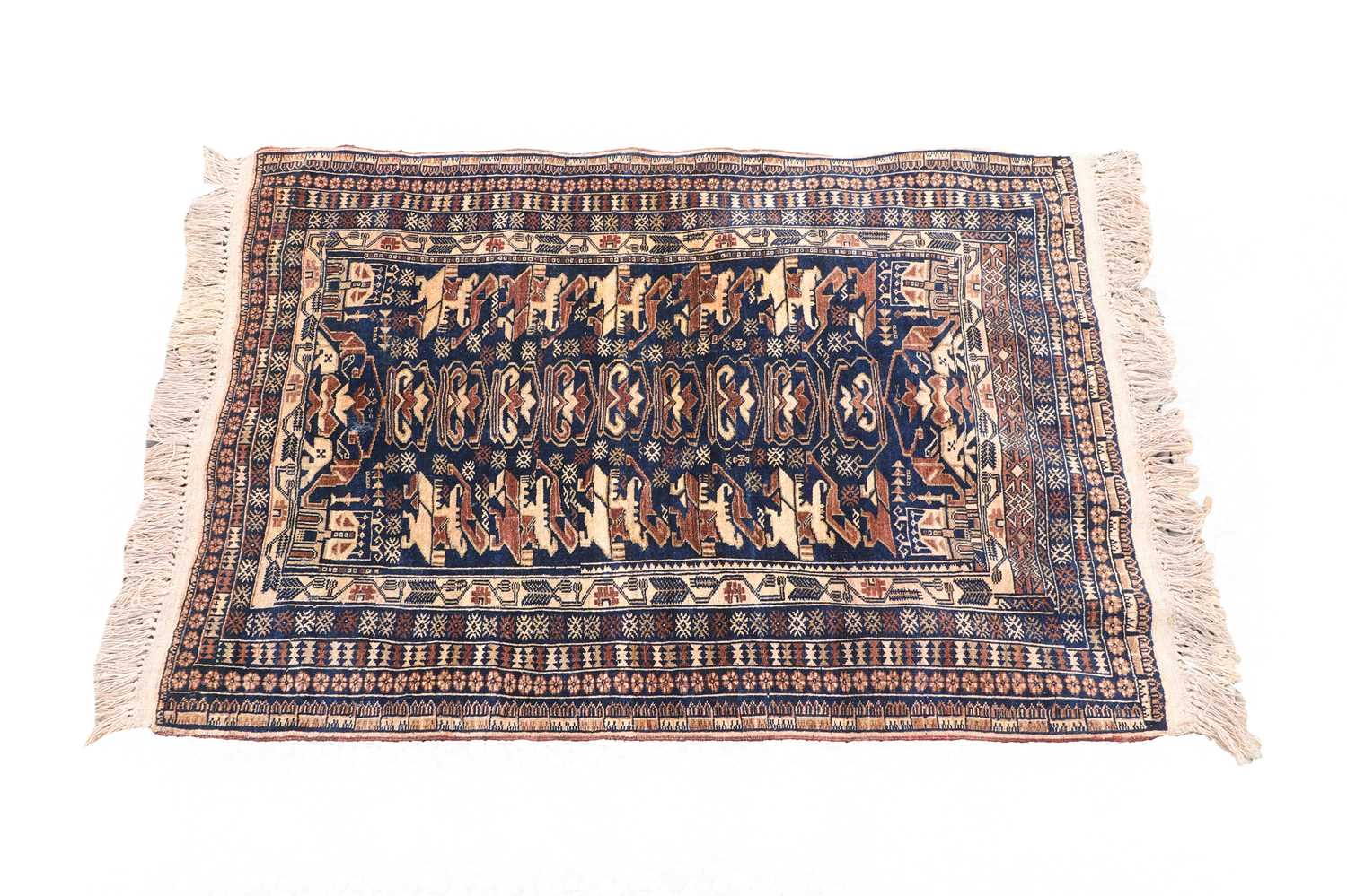 Lot 283 - A Persian woollen rug