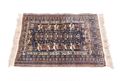 Lot 283 - A Persian woollen rug