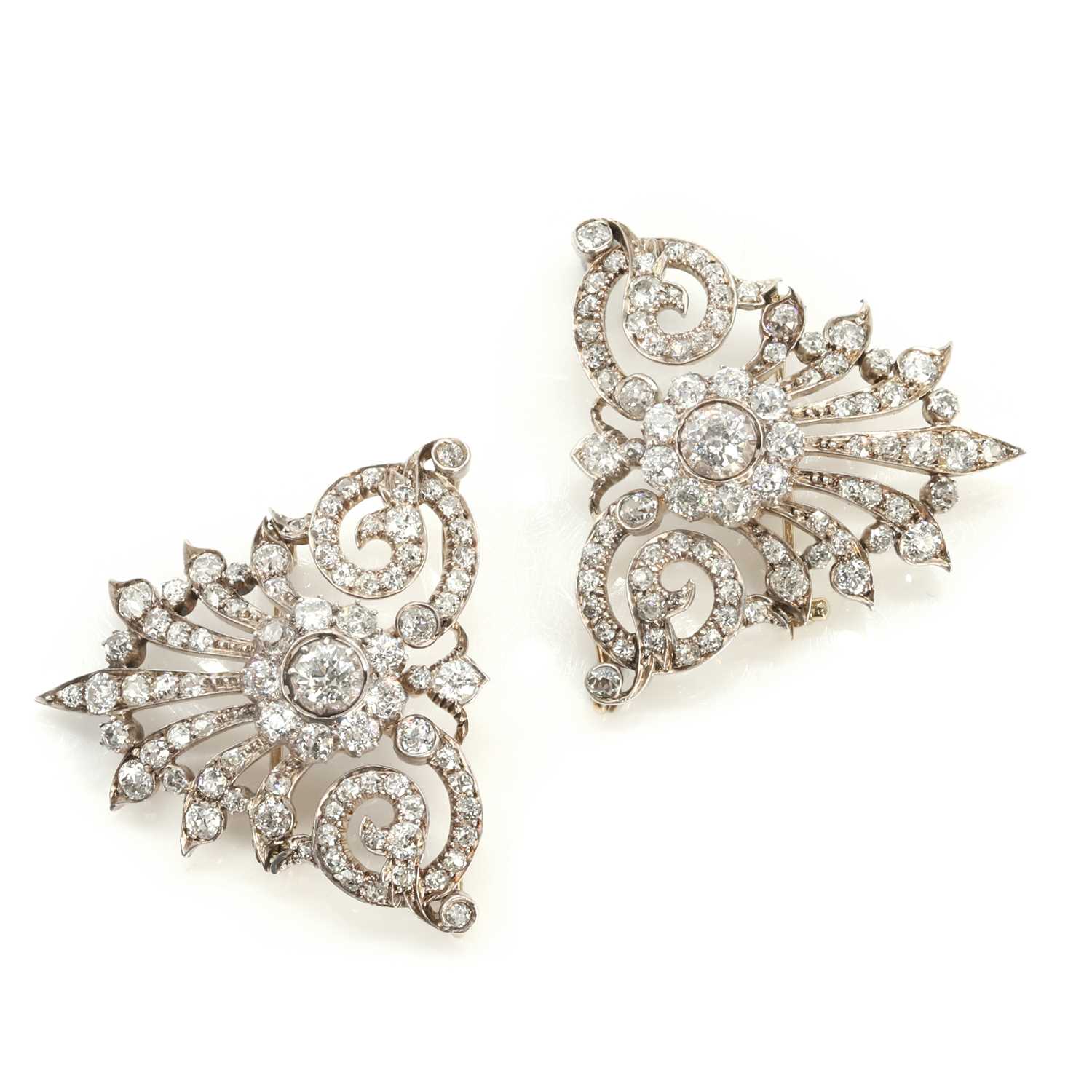 Lot 55 - A set of two old cut diamond brooches