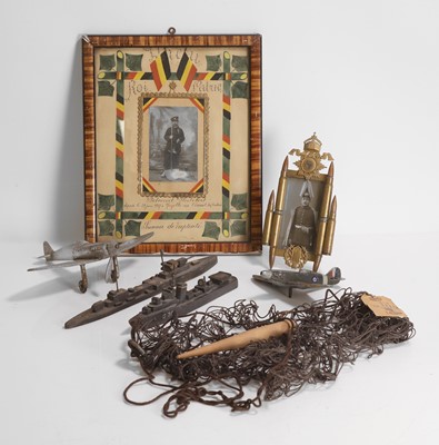 Lot 145 - A collection of military folk art