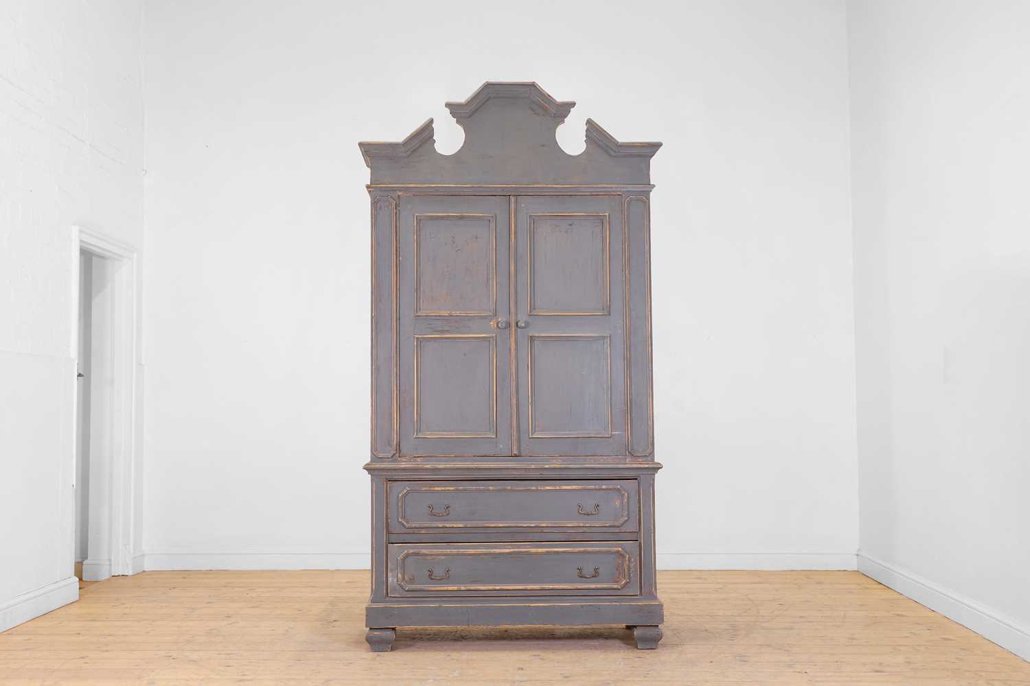 Lot 38 - A small painted pine linen press