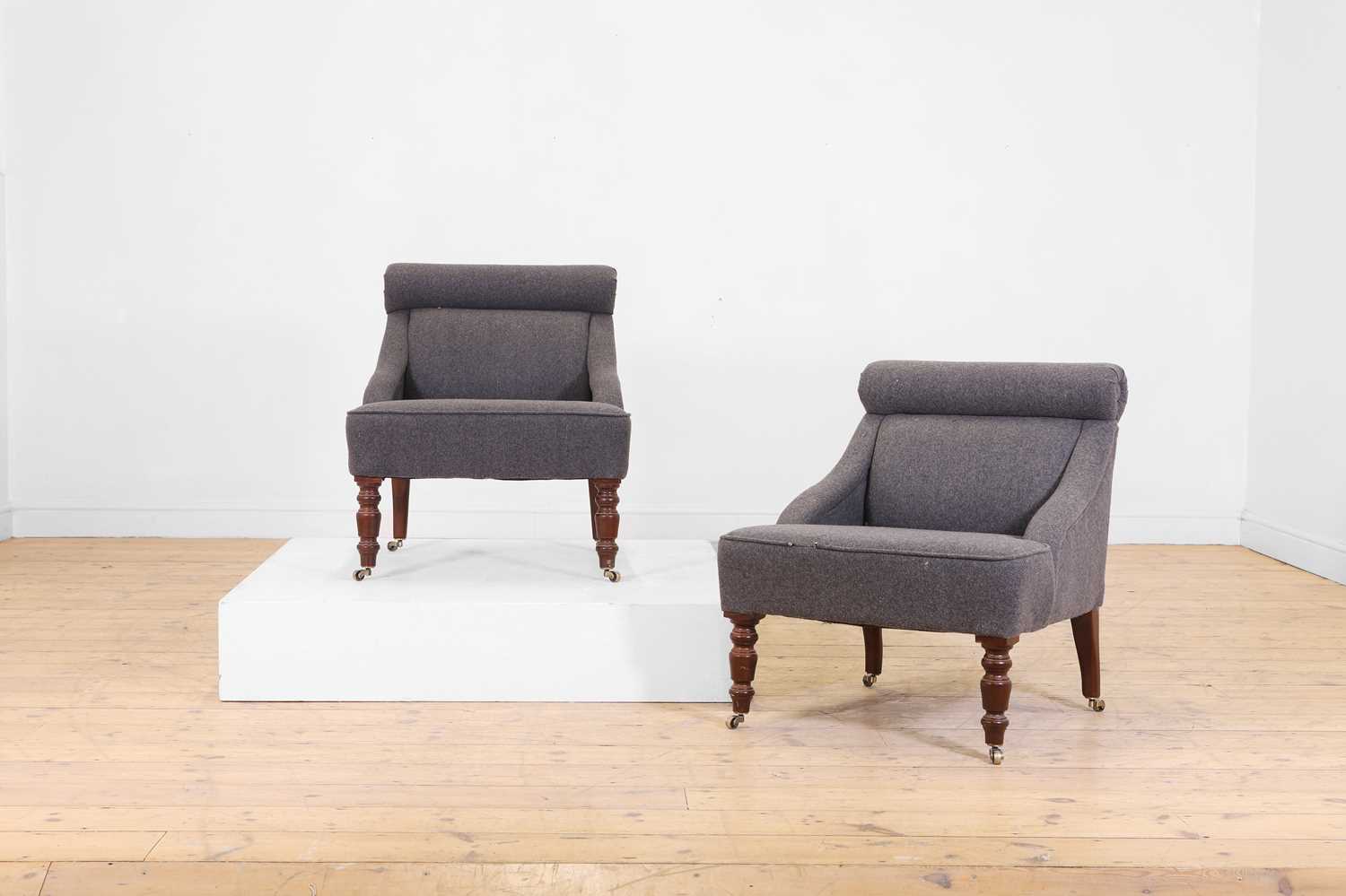 Lot 46 - A pair of upholstered low chairs