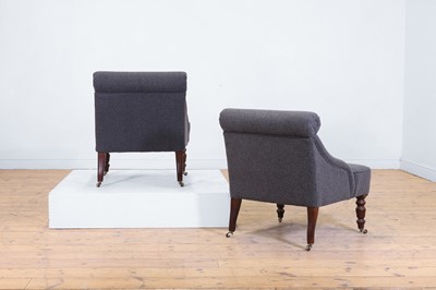 Lot 46 - A pair of upholstered low chairs