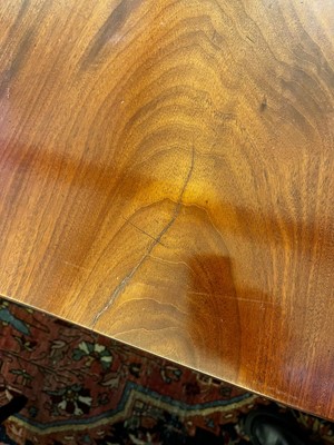 Lot 571 - A large George III figured mahogany extending dining table in the manner of Gillows